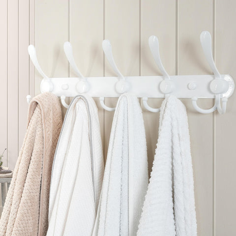Dseap coat rack holds coats and hats in a tidy mudroom
