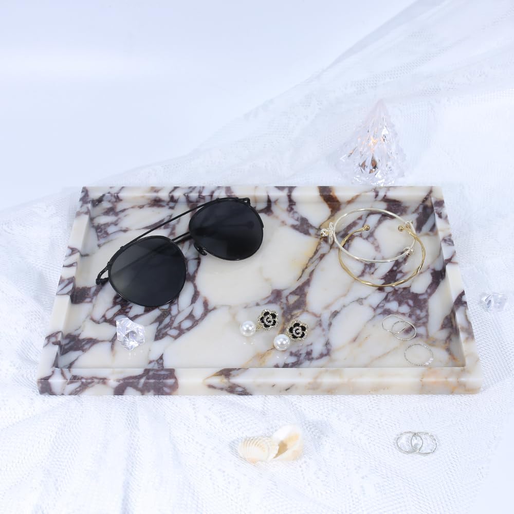DUANYAN marble tray displaying perfume bottles neatly.