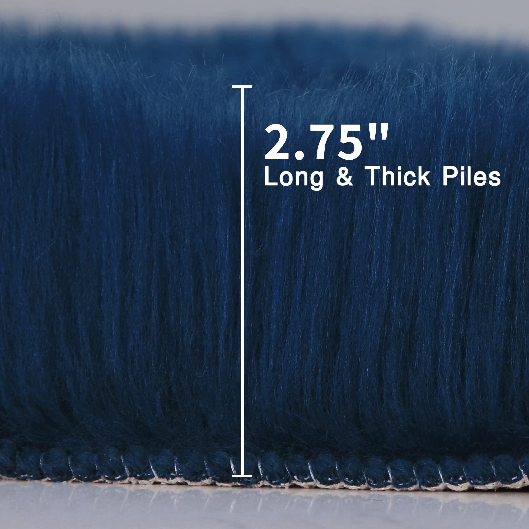 duduta Navy Blue Runner Rug on floor shows non-slip suede backing for stability.