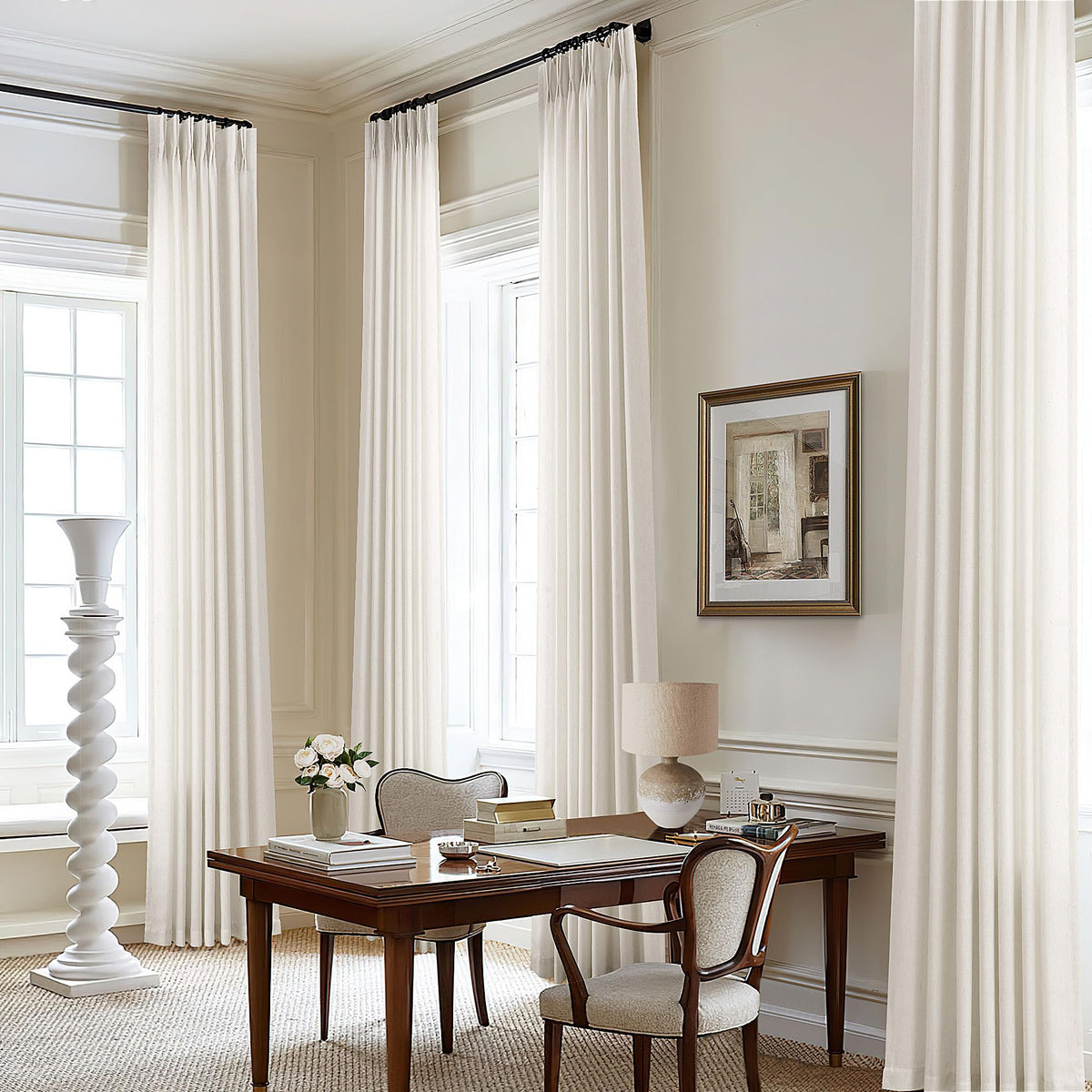 DUKIYO 105-inch cream semi-sheer curtains diffuse daylight for an airy living room.