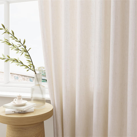DUKIYO light-filtering curtains soften harsh sun while keeping interior bright.