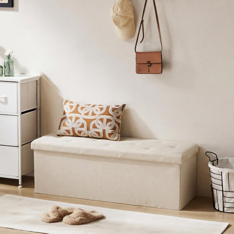 DUMOS gray storage ottoman with open lid showing 90L capacity.
