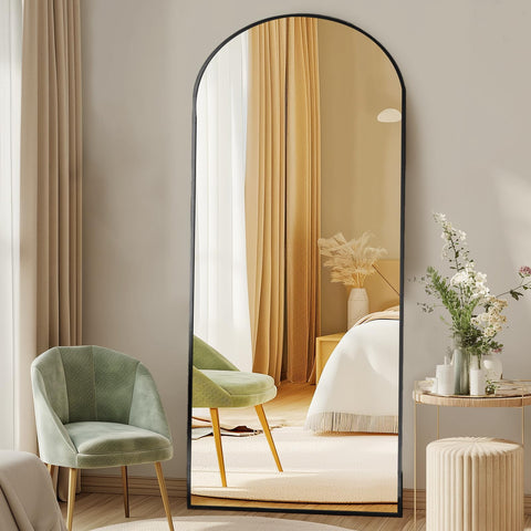 DUMOS arched full-length mirror on stand for easy full-body checking.