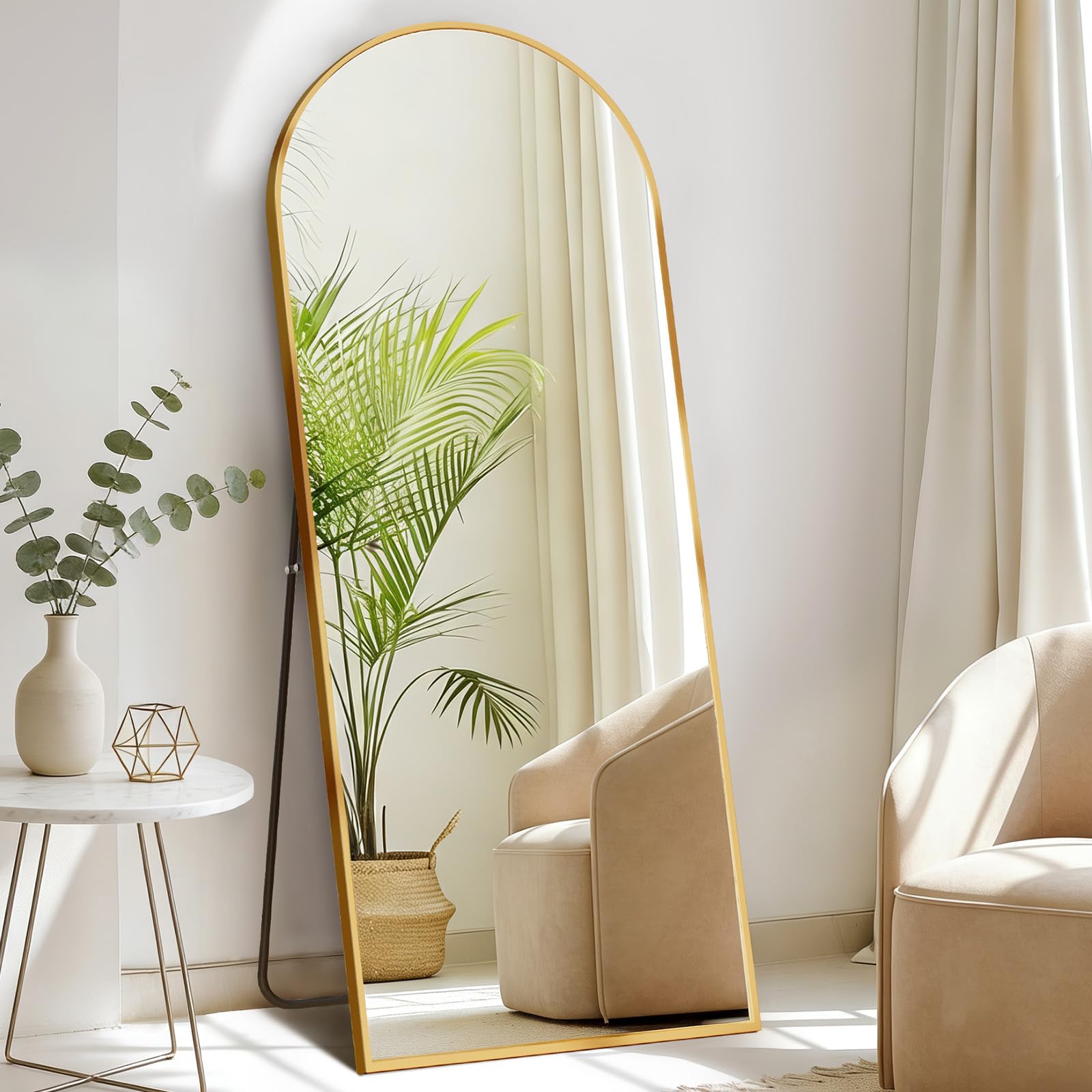 DUMOS arched full-length mirror on stand reflecting outfit details for styling.