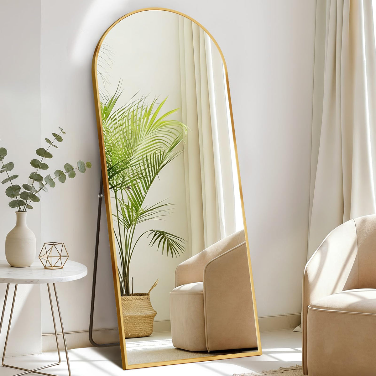 DUMOS arched full-length mirror on stand reflecting outfit details for styling.