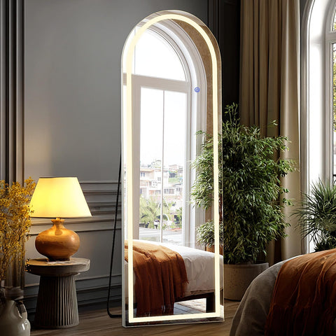 DUMOS arched LED mirror with stand for accurate outfit checks.