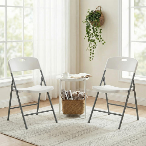 DUMOS folding chair with ergonomic curved seat for comfortable long sessions