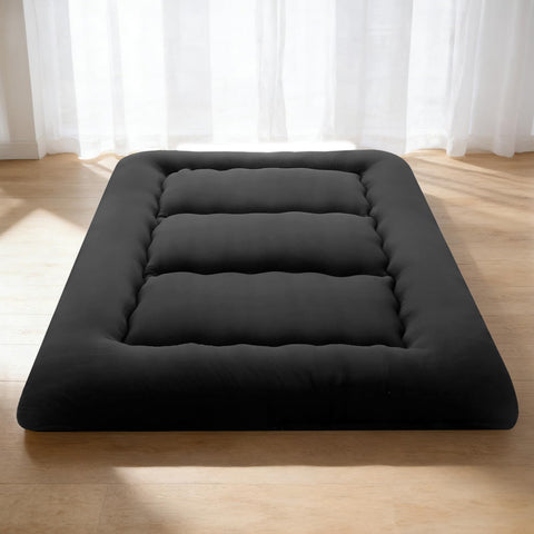 DUMOS twin Japanese floor mattress in vacuum-packed packaging for easy shipping