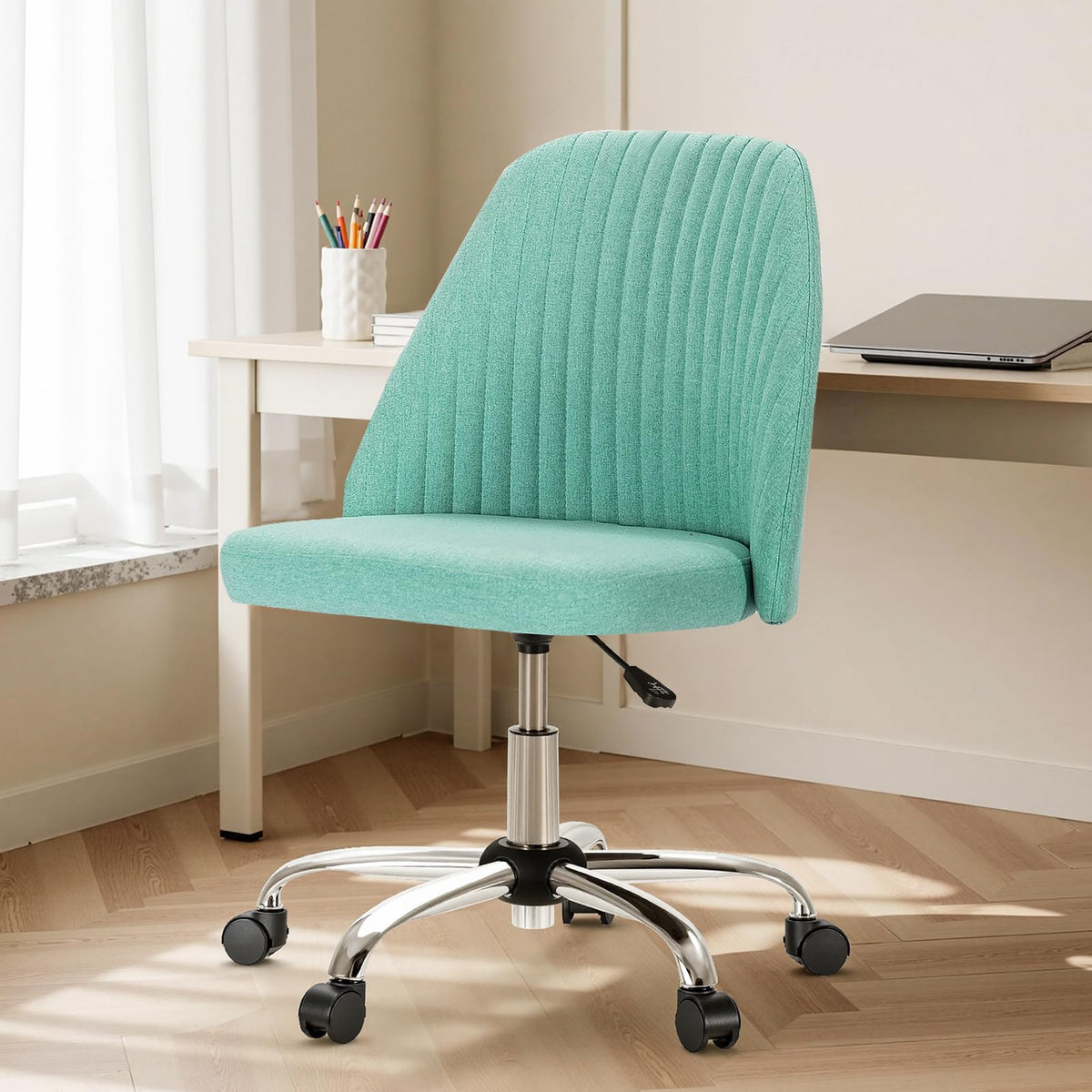 DUMOS office chair with wide seating provides comfortable all-day use.