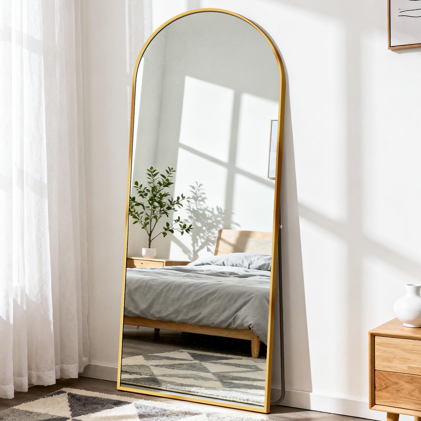 DUMOS space-saving design mirror enhances small rooms without crowding.