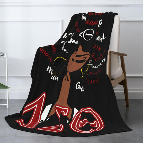 DUNKEZON flannel throw fabric closeup shows soft, breathable fibers for all seasons.