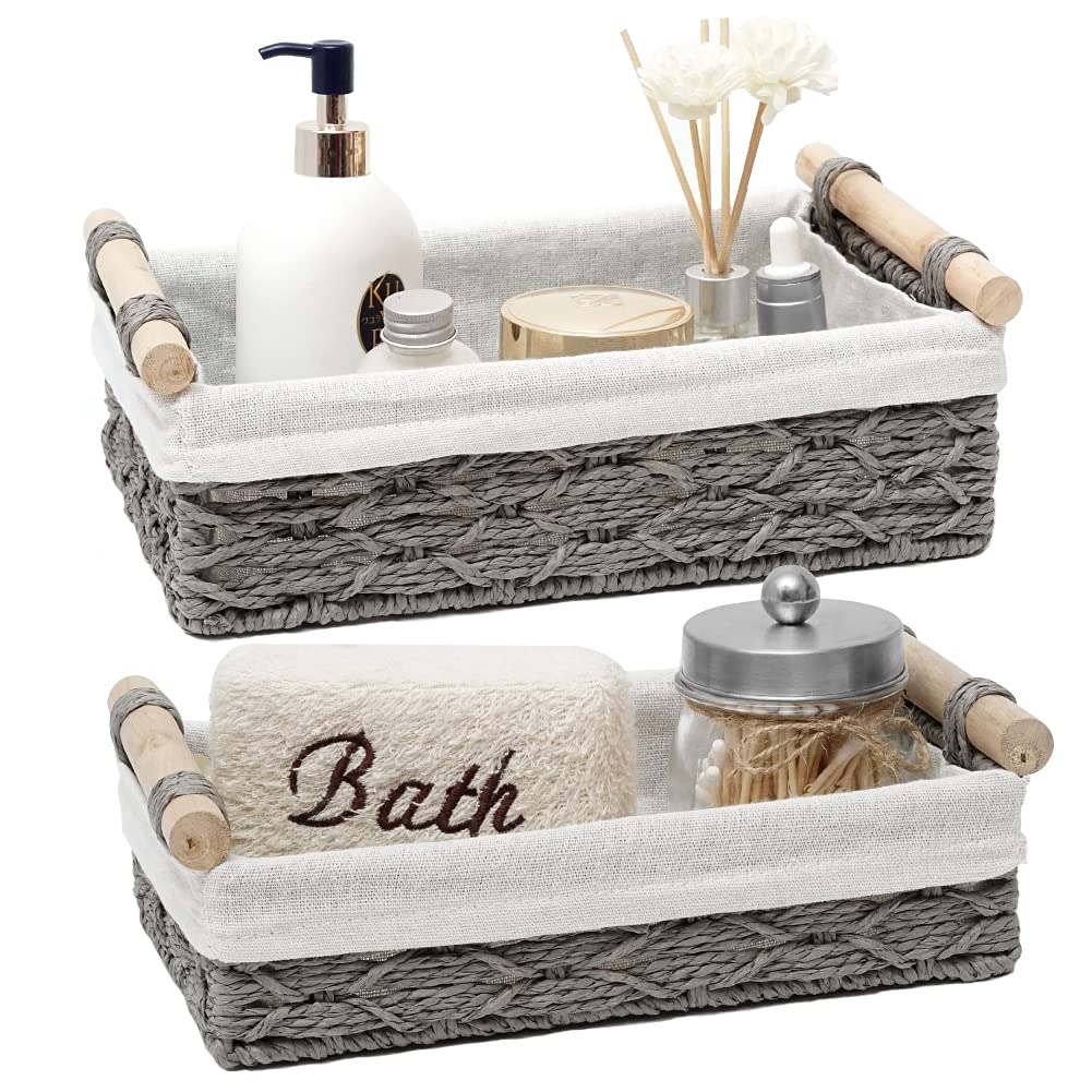 DUOER storage basket on a toilet tank top for tidy bathroom organization.