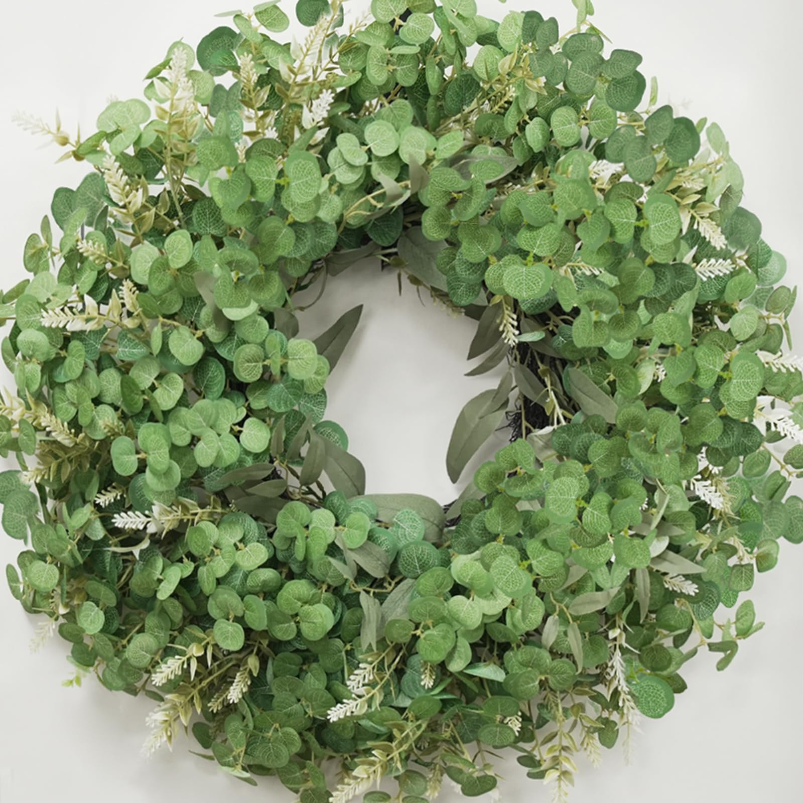 Large hanging eucalyptus wreath ready to frame entryways with ease.