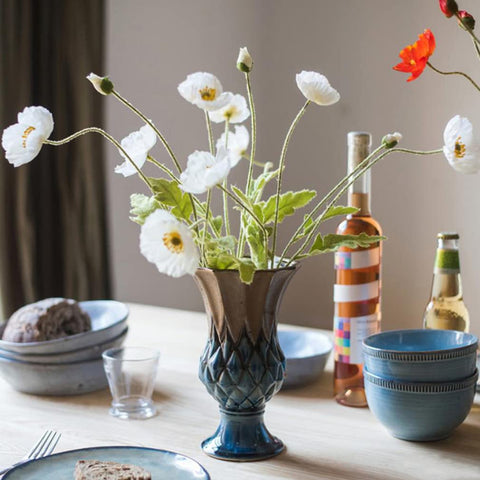 Close-up of DUYONE poppy blooms highlighting pastel tones and flocked texture