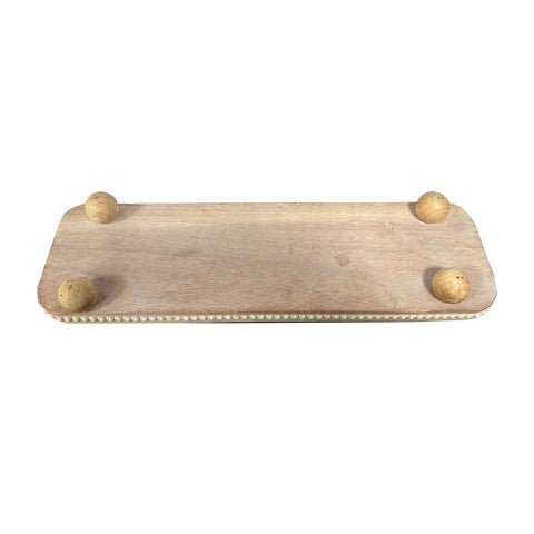 Dwellington oval wooden decorative tray white wash on coffee table, organizes small decor.