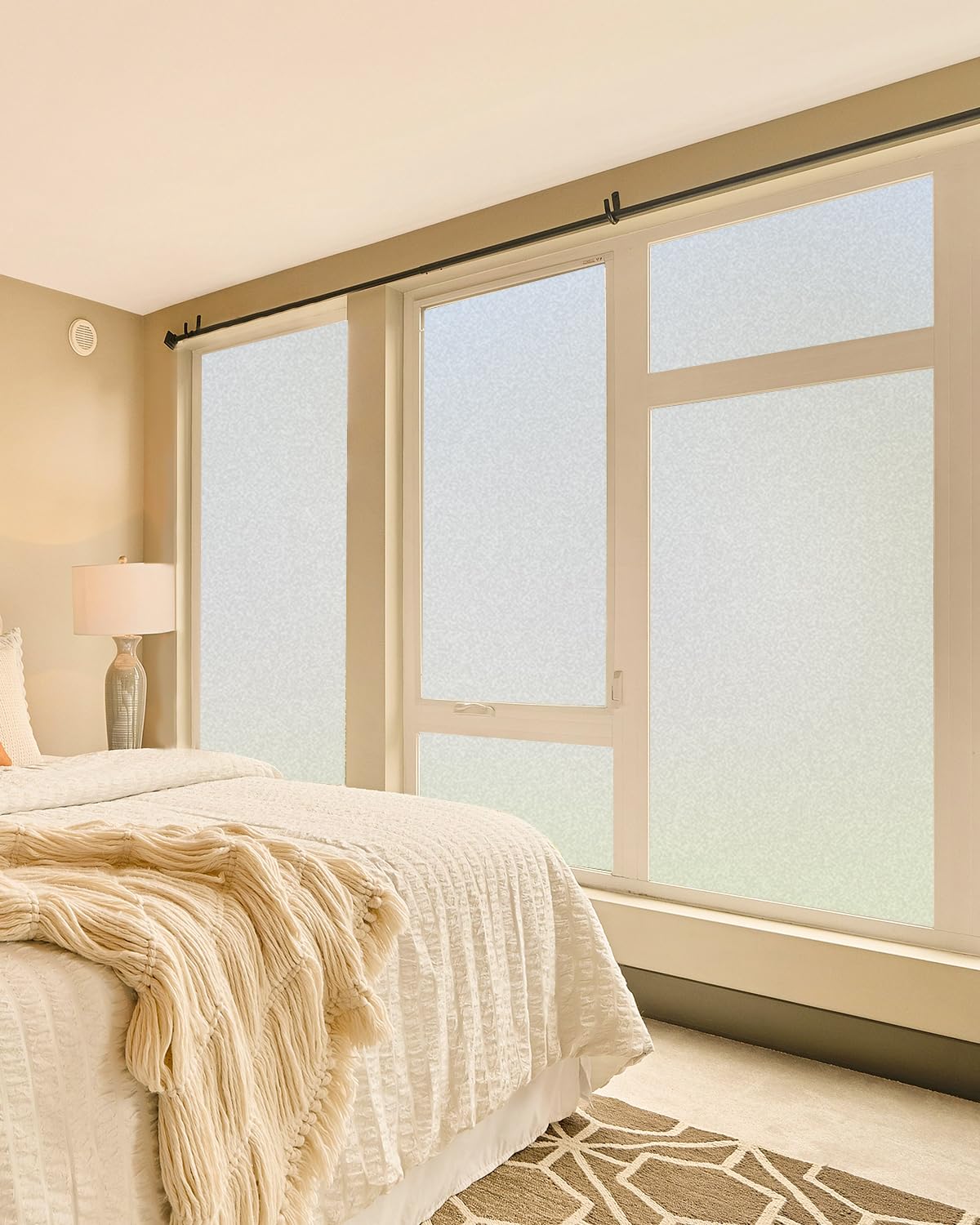 Dwersty privacy film provides glare-free daylight and cozy rooms.