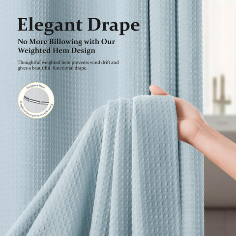 Dynamene Fog Blue curtain water-repellent finish helps keep walls drier.