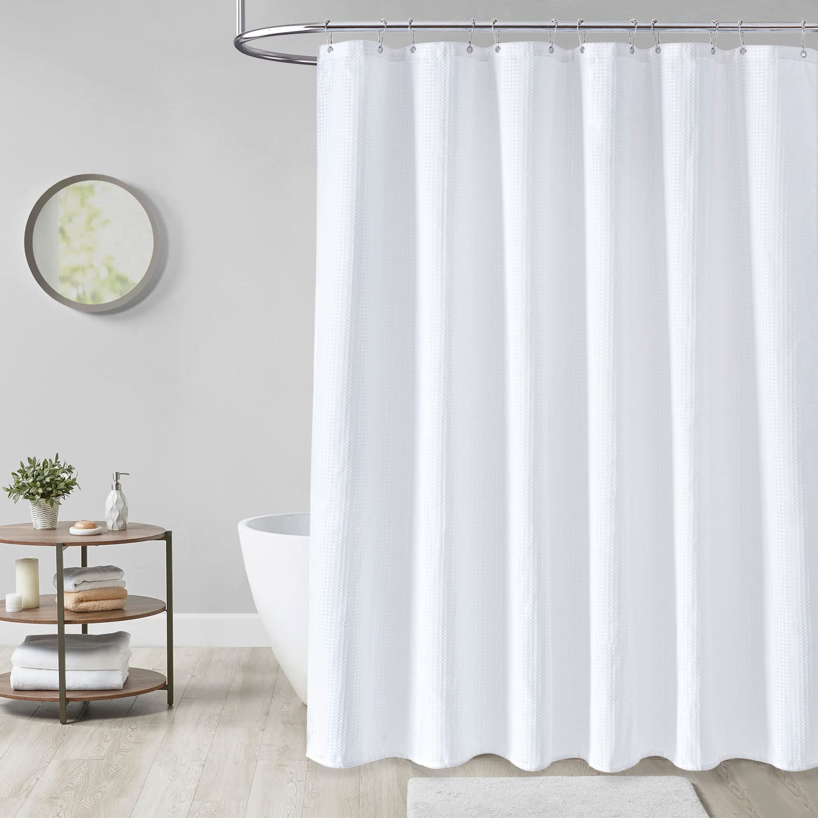 Dynamene white curtain in a modern bathroom, complementing decor and vibe.