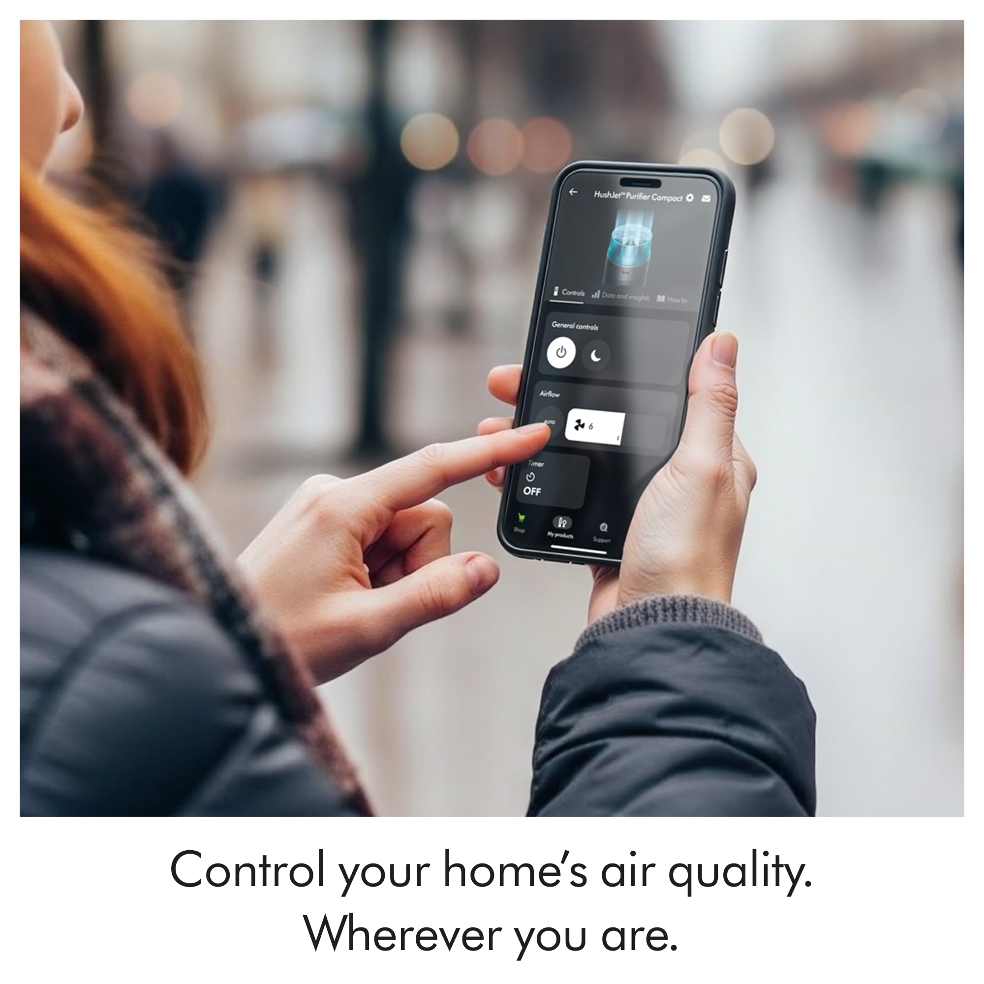 Dyson HushJet product in a modern living space demonstrating cleaner air around seating area.
