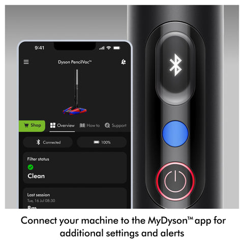 Dyson PencilVac on a magnetic charging dock for convenient storage.