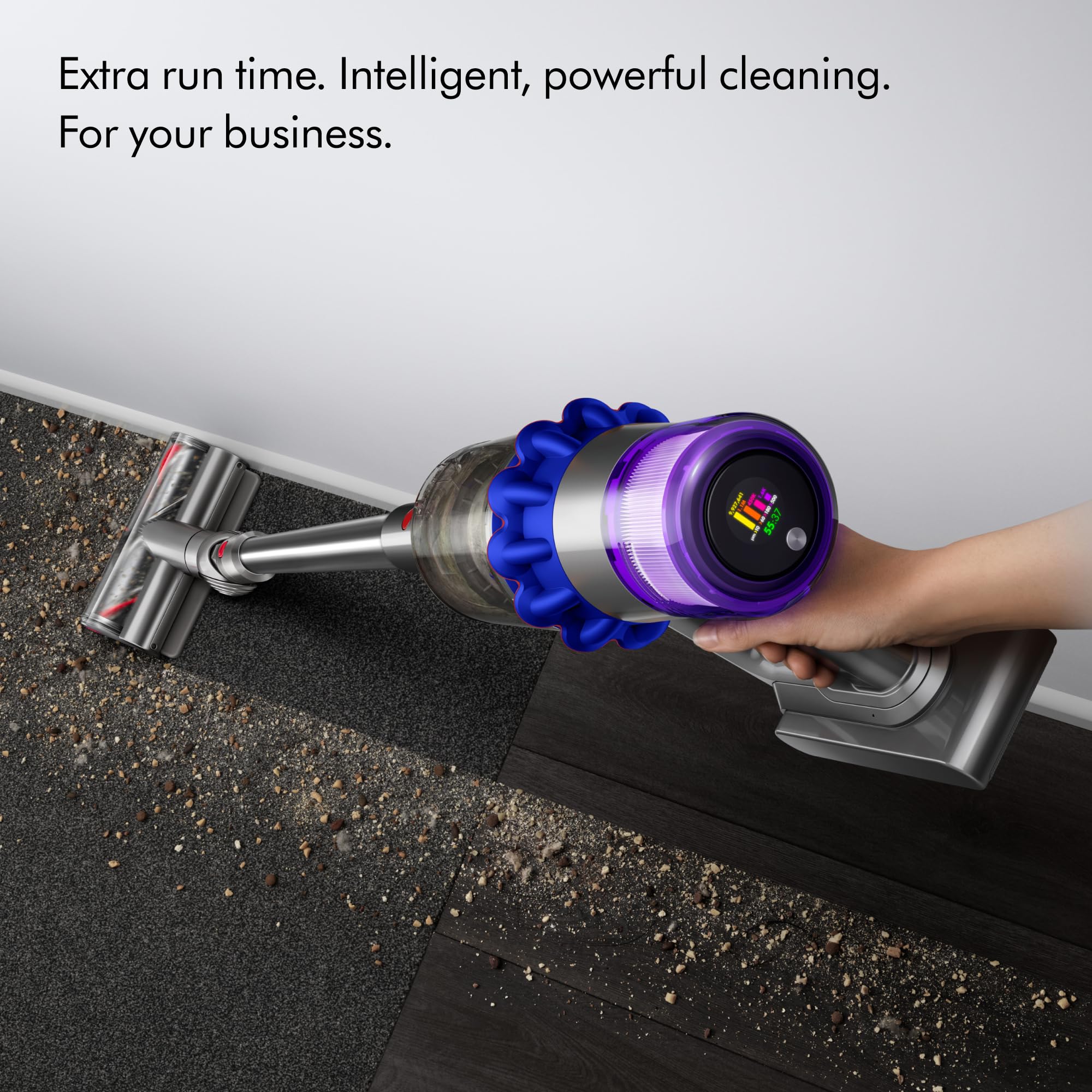 Dyson V15 Detect Pro LCD screen displaying debris and status during cleaning.