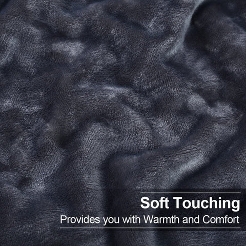 EASELAND dark grey blanket on a couch showing versatile styling and easy care.