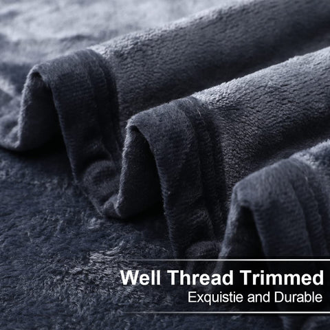 EASELAND microplush blanket draped on bed delivering lightweight warmth and comfort.