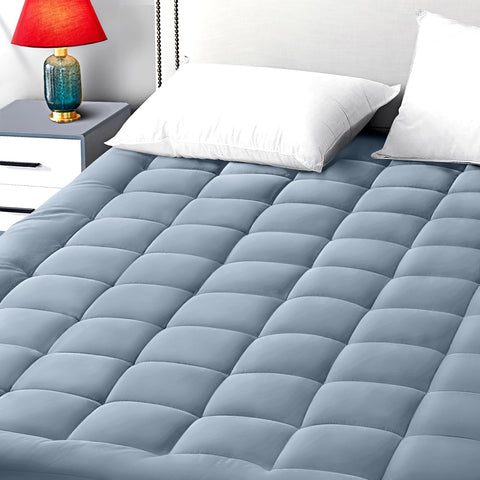 EASELAND queen-size mattress pad with dusty blue topper provides breathable comfort.