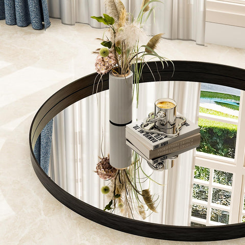 Easly black round mirror close-up highlighting minimalist frame detail