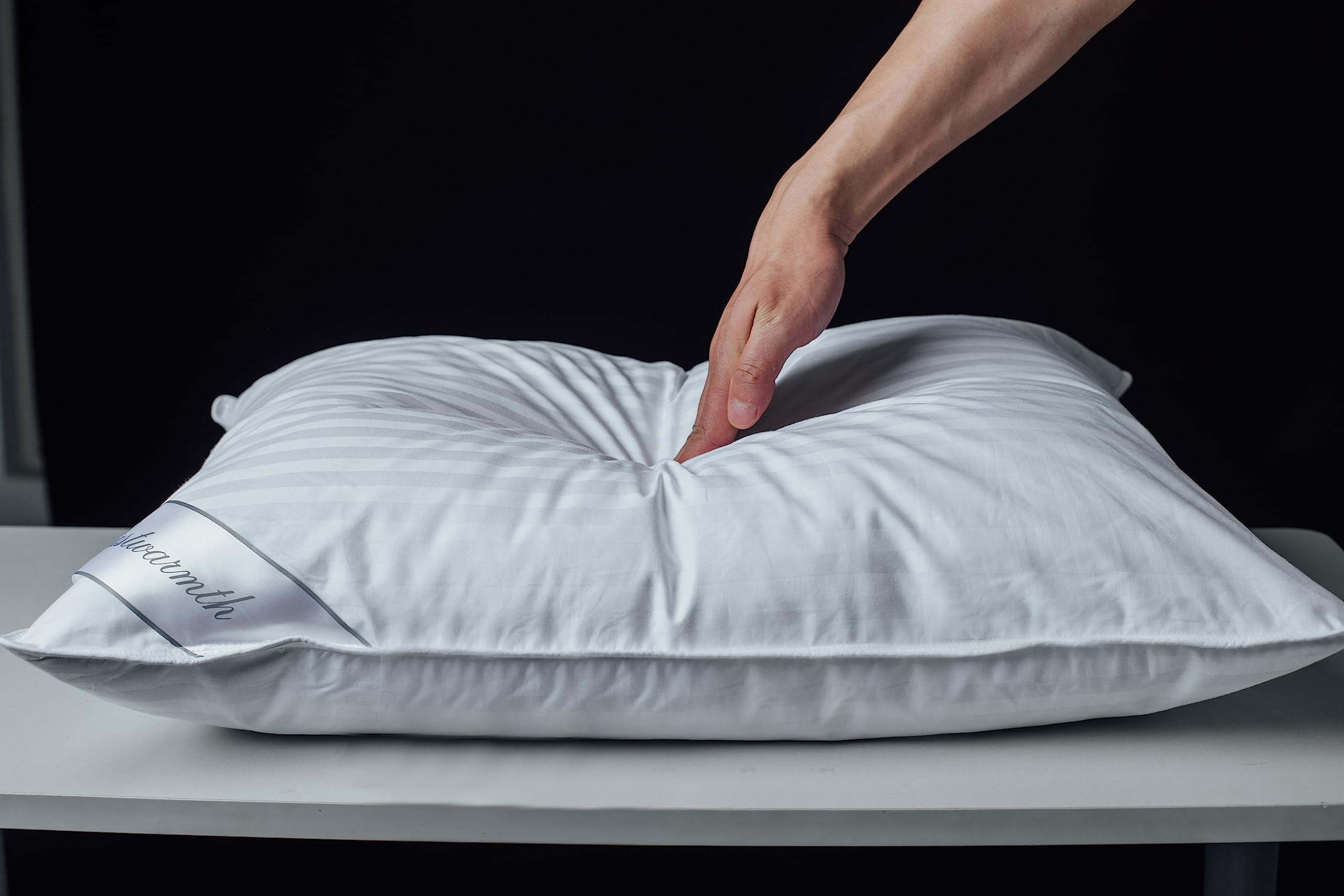 Eastwarmth pillow features double stitching and piping to prevent feather poke