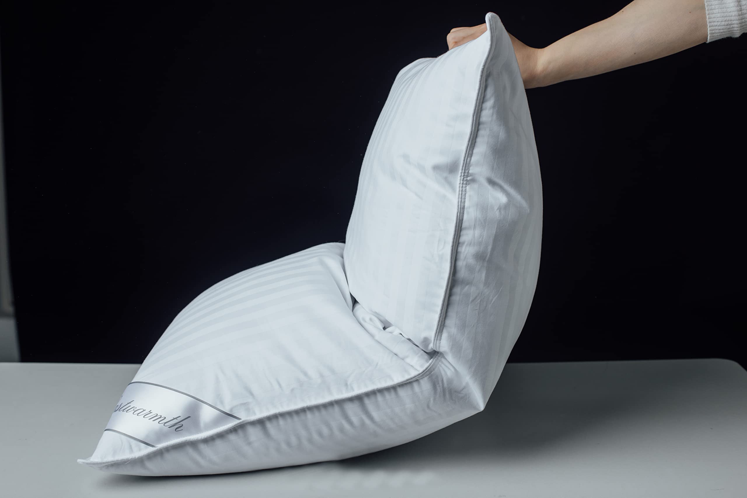Lofted Eastwarmth goose down pillow provides balanced neck support