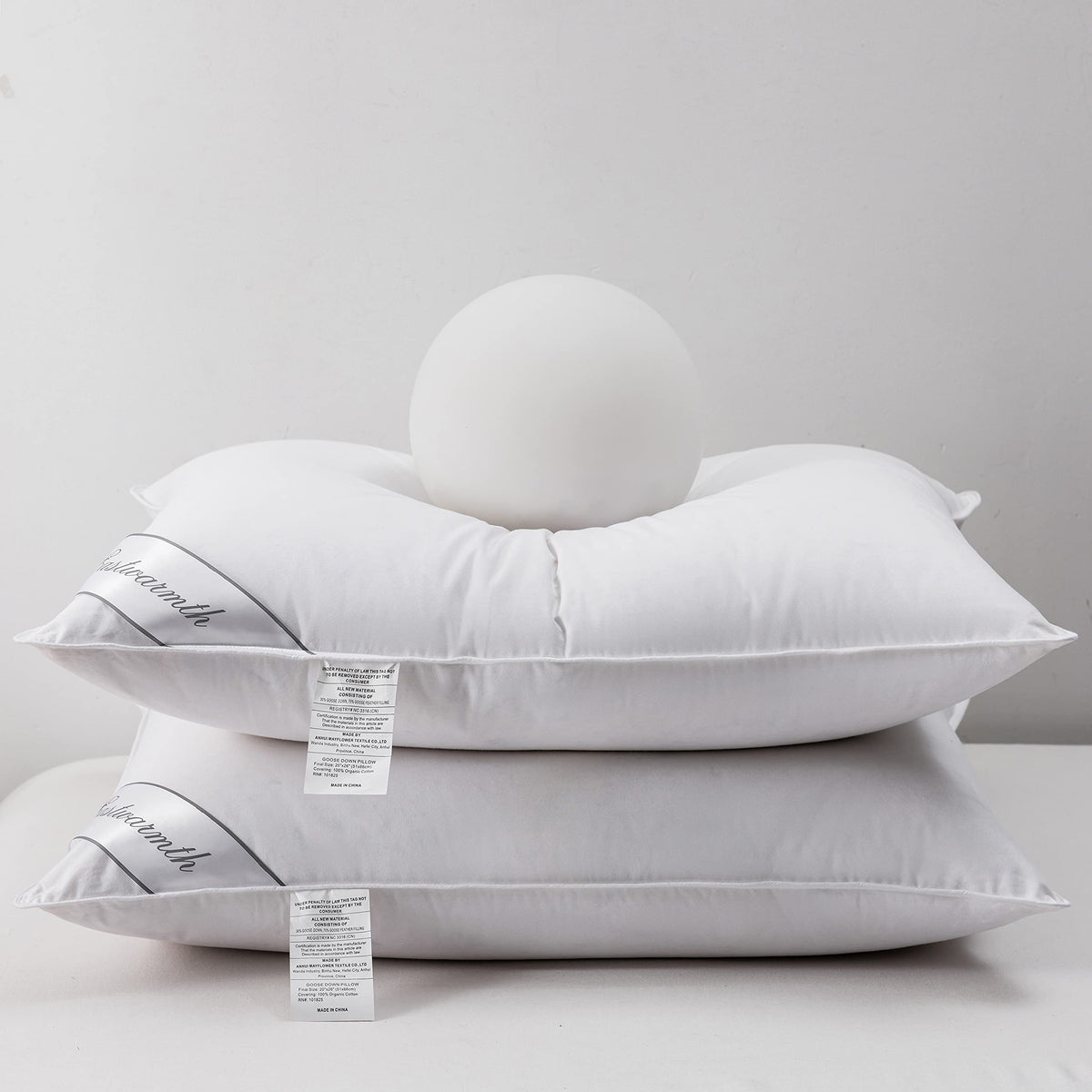 Eastwarmth pillow front view showing plush surface and neck support.