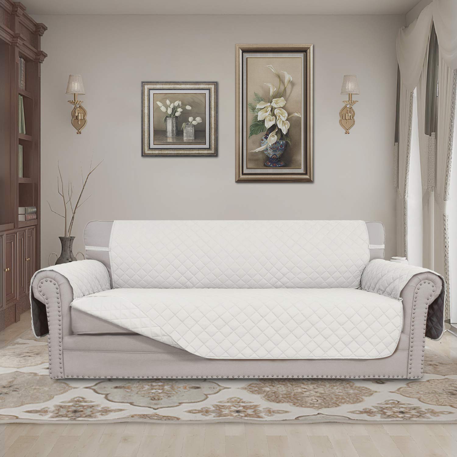 Ivory reversible sofa cover offers two color options for versatile styling.