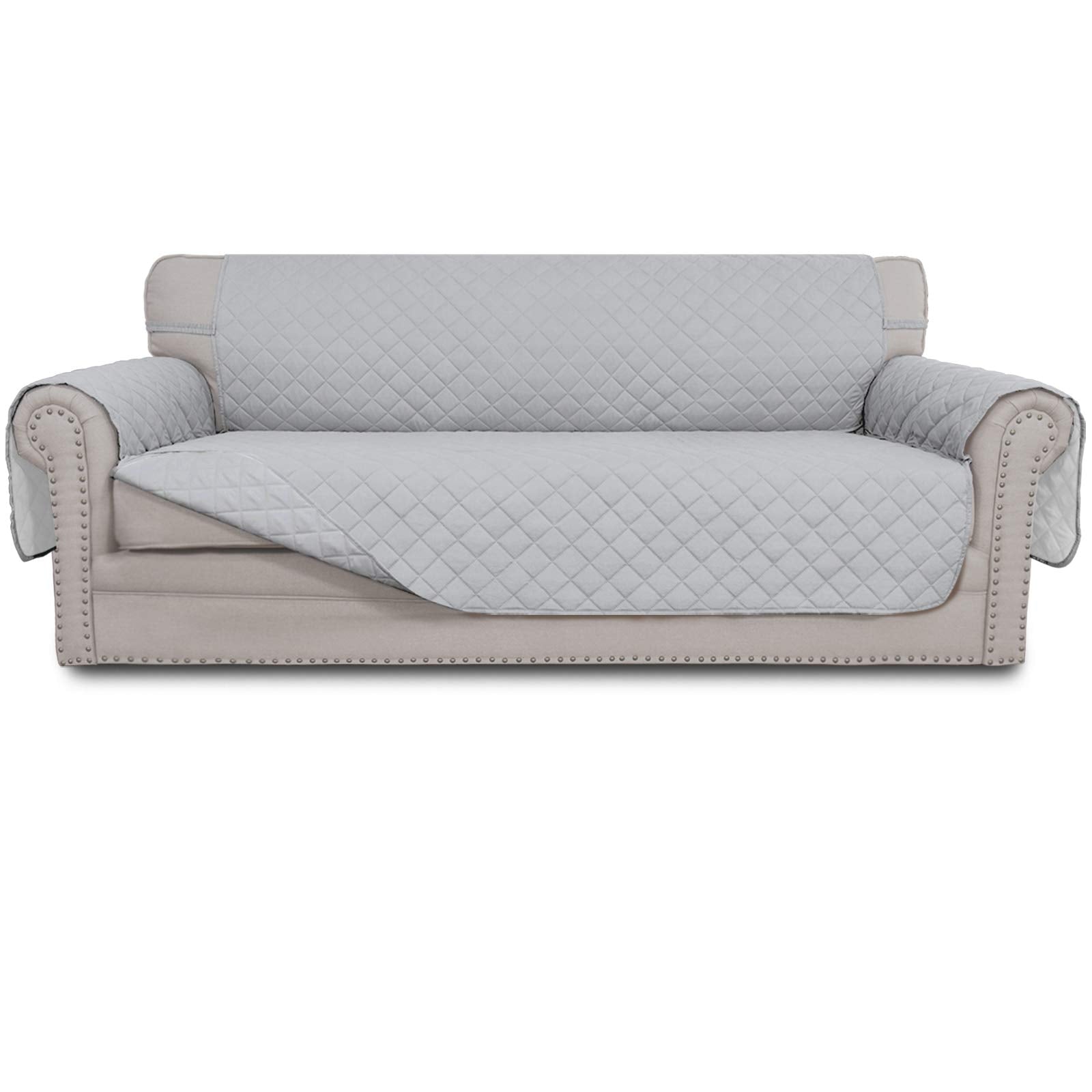 Easy-Going reversible couch cover on a 3-cushion sofa protects against spills and fur.