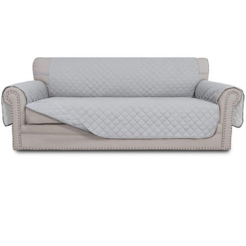 Easy-Going reversible couch cover on a 3-cushion sofa protects against spills and fur.