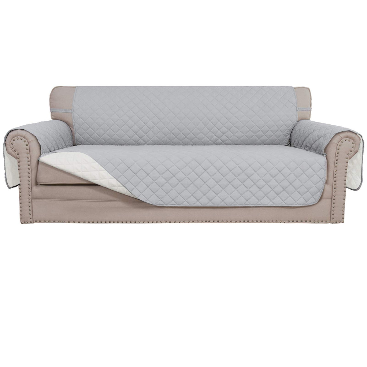 Easy-Going reversible couch cover on a three-seat sofa protects against spills.