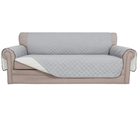Easy-Going reversible couch cover on a three-seat sofa protects against spills.