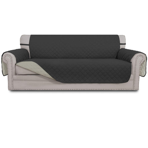 Easy-Going reversible couch cover in dark gray protecting a sofa and showing resilience against daily use