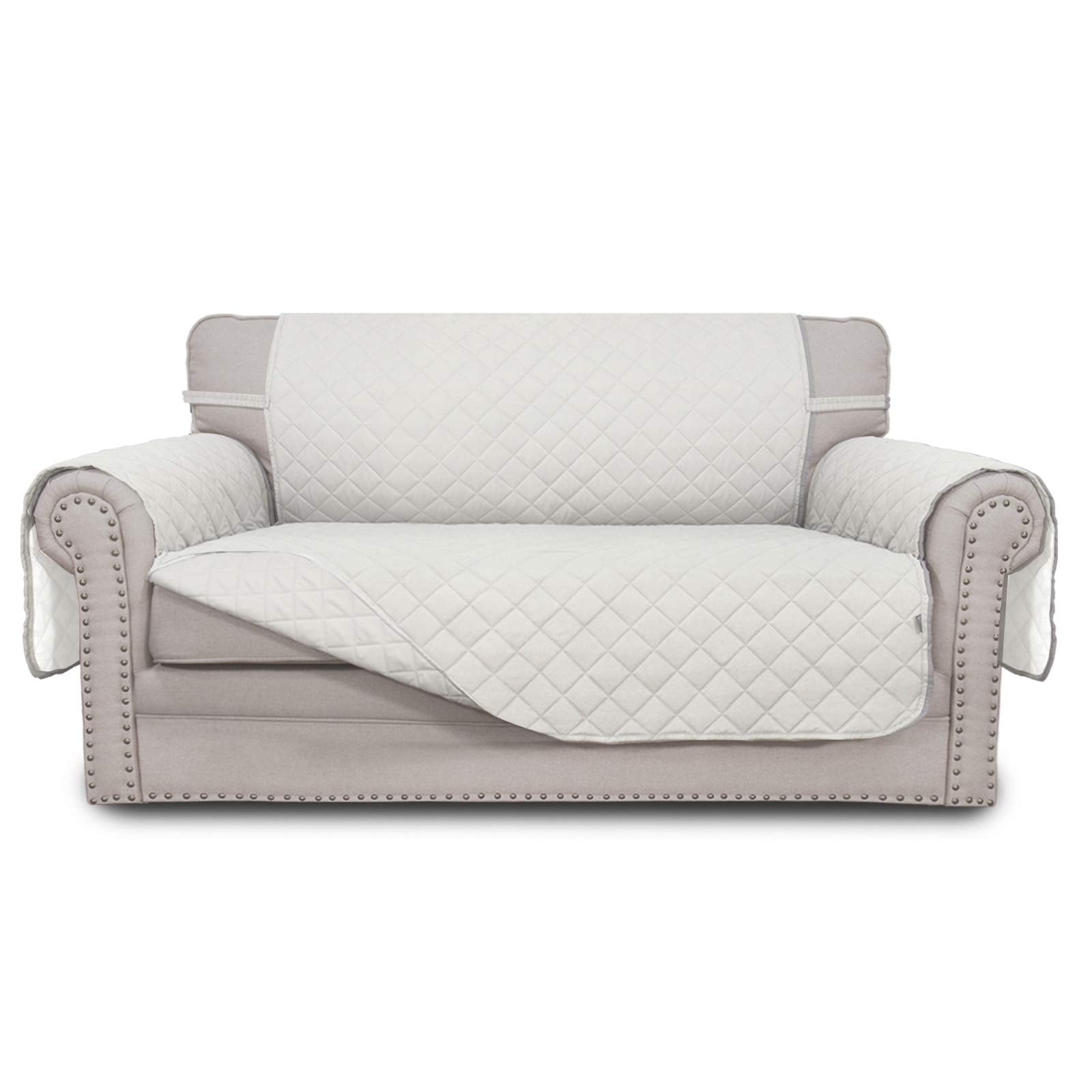 Easy-Going reversible loveseat cover ivory-quilted texture protects furniture while elevating room style.