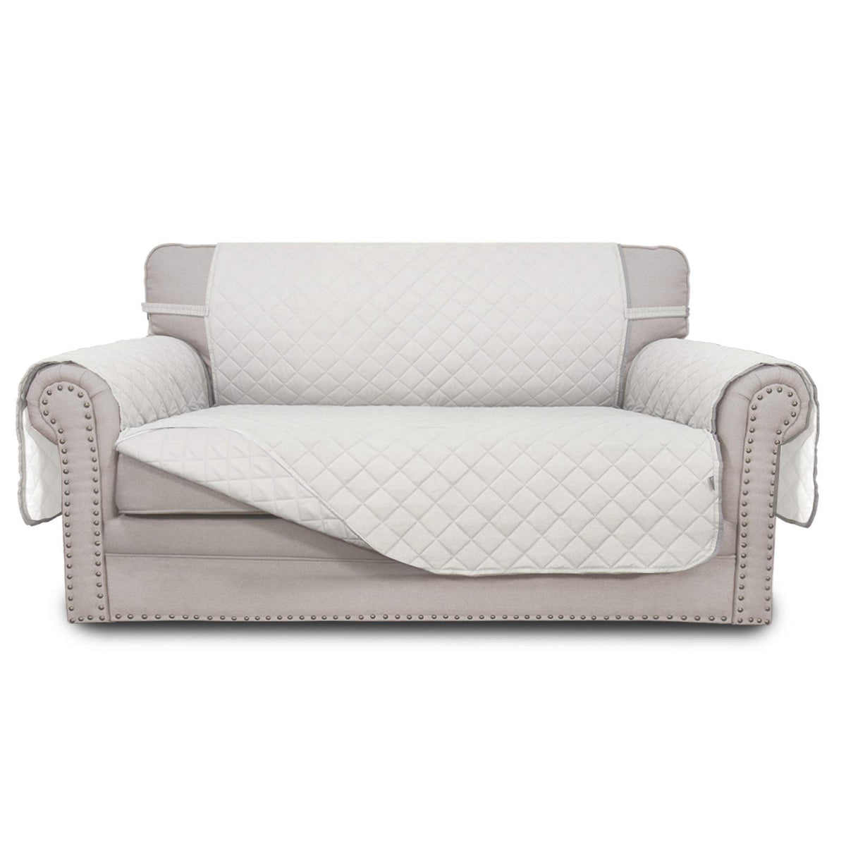 Easy-Going reversible loveseat cover ivory-quilted texture protects furniture while elevating room style.
