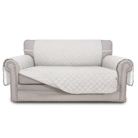 Easy-Going reversible loveseat cover ivory-quilted texture protects furniture while elevating room style.