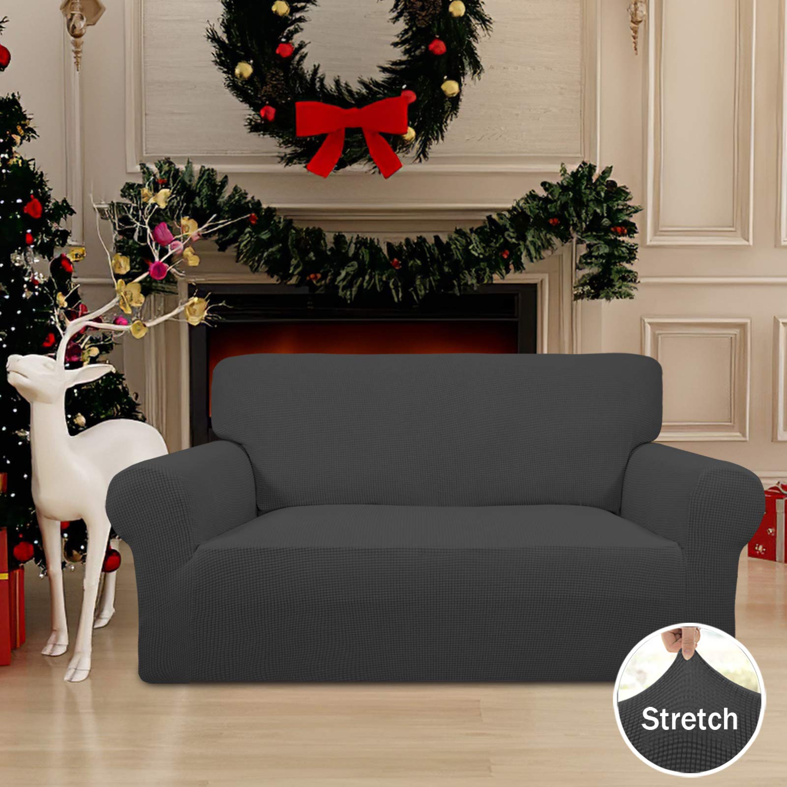Easy-Going slipcover in dark gray offers durable, family-friendly protection.