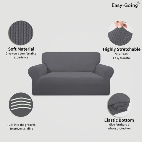 Easy-Going Slipcover in grey protects loveseat from daily wear and stains.