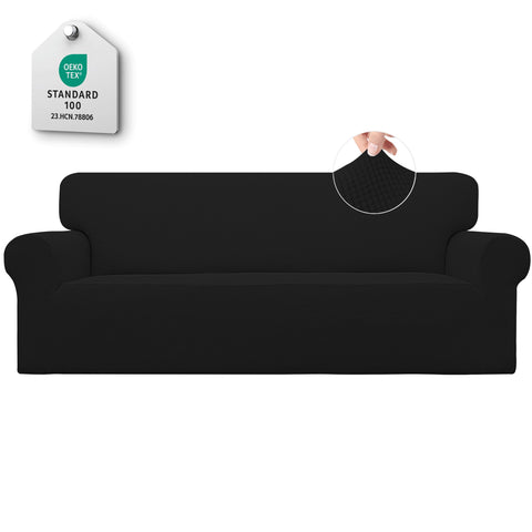 Easy-Going Stretch Sofa Slipcover shows a snug fit on a black sofa.