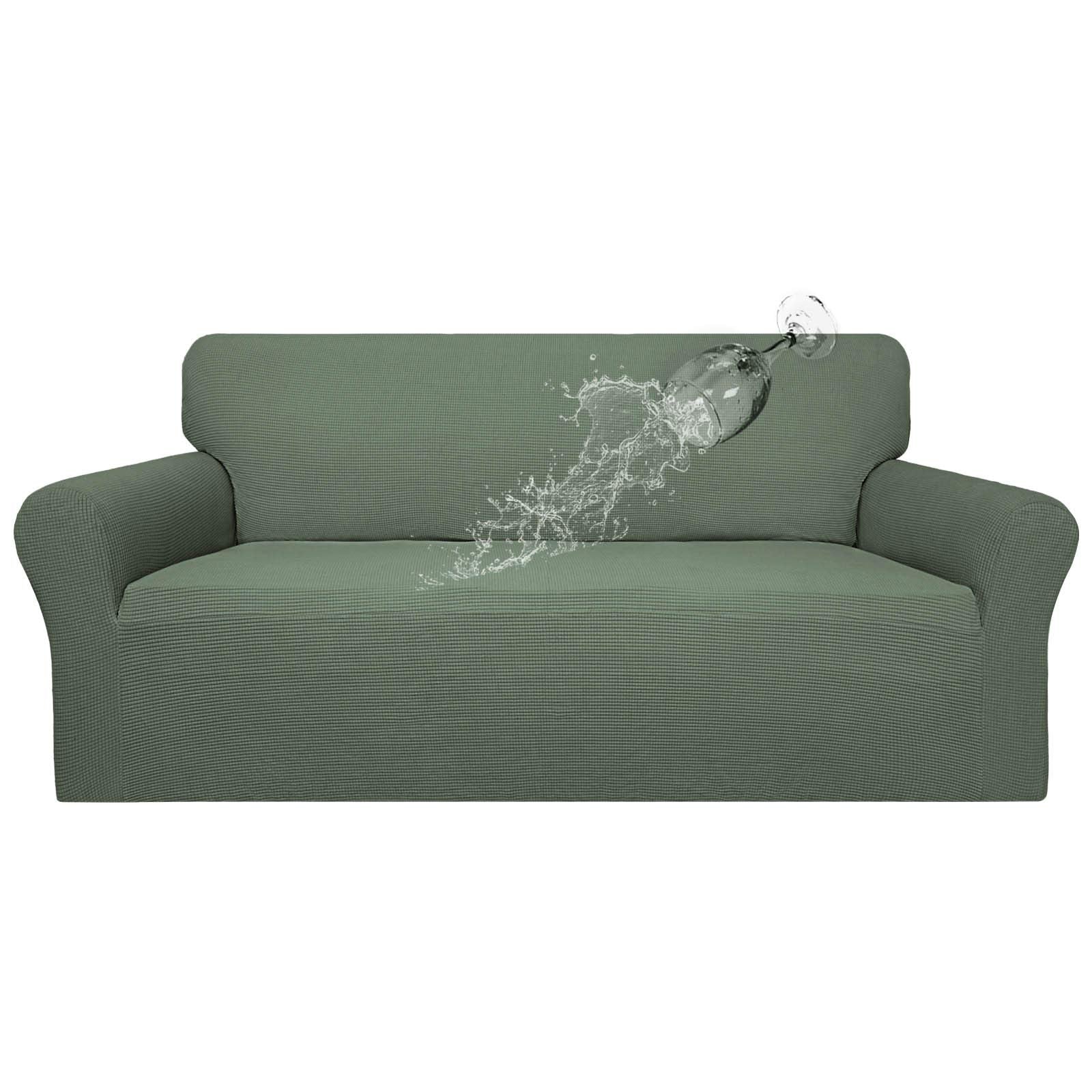 Easy-Going waterproof couch cover in grayish green protects upholstery from spills.