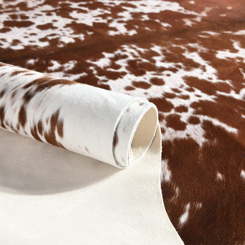 Easycozy cowprint rug in dining room style with natural texture.