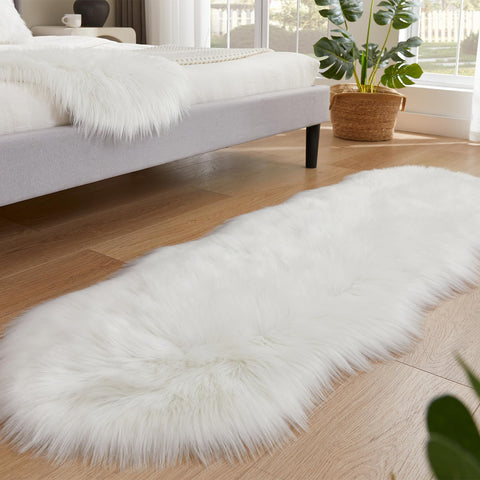 EasyJoy 2x6 feet sheepskin rug in living room complements seating areas.