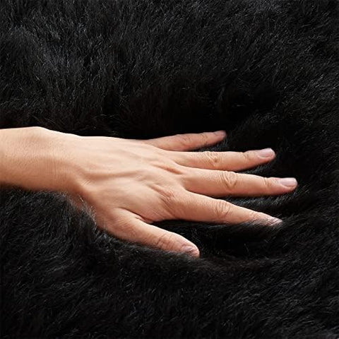 EasyJoy black rug close-up highlights velvet pile and durable fibers.