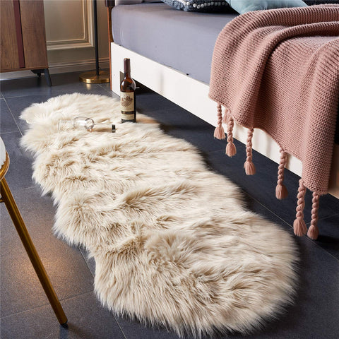 EasyJoy ultra-soft fluffy sheepskin rug in beige adds cozy luxury to any room.