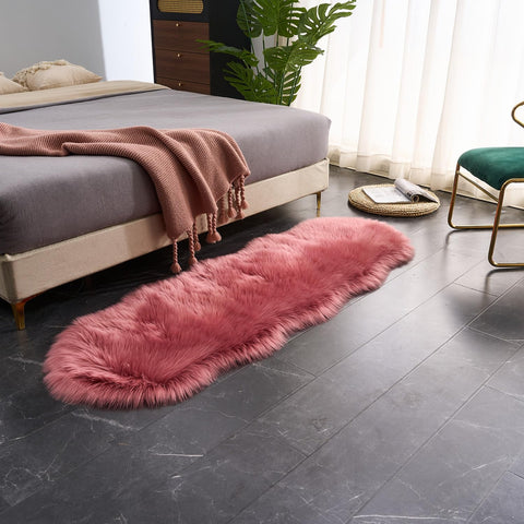 EasyJoy Ultra Soft Fluffy Sheepskin Rug non-slip back for safe placement on wood floors.